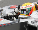 Lewis Hamilton gives the thumbs-up to the crowd on his outlap
