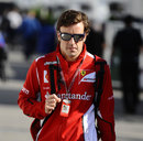 Fernando Alonso arrives in the paddock on Saturday morning