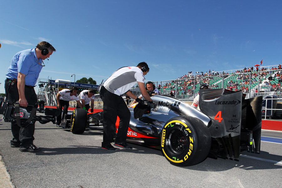 Lewis Hamilton returns to the McLaren garage