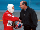 Michael Schumacher shakes hands with Ron Dennis