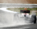 Sebastien Buemi slides his Toro Rosso through Jerez's chicane