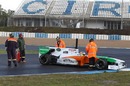 Force India test driver Paul di Resta spins out on a wet track