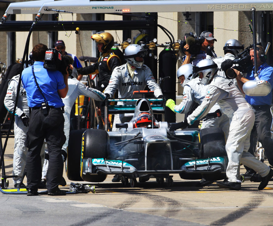 Michael Schumacher retires with a jammed DRS