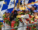 The Audi team celebrates victory at Le Mans