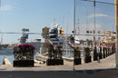 Valencia's harbour reflected in the McLaren motorhome