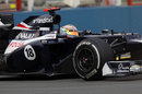 Pastor Maldonado aims for an apex during first practice