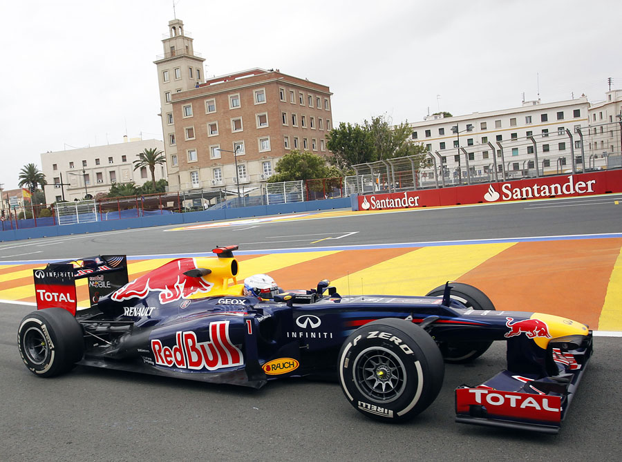 Sebastian Vettel returns to the pits in the Red Bull