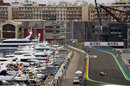 Felipe Massa passes yachts in the harbour