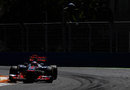 Jenson Button attacks the apex in his McLaren