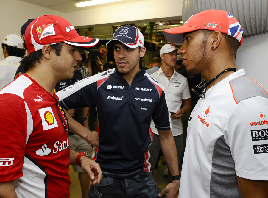 Felipe Massa, Pastor Maldonado and Lewis Hamilton chat ahead of the race