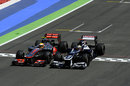 Lewis Hamilton and Pastor Maldonado go wheel to wheel