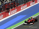 Fernando Alonso crosses the line for victory