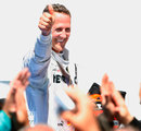 Michael Schumacher celebrates his first podium since his comeback
