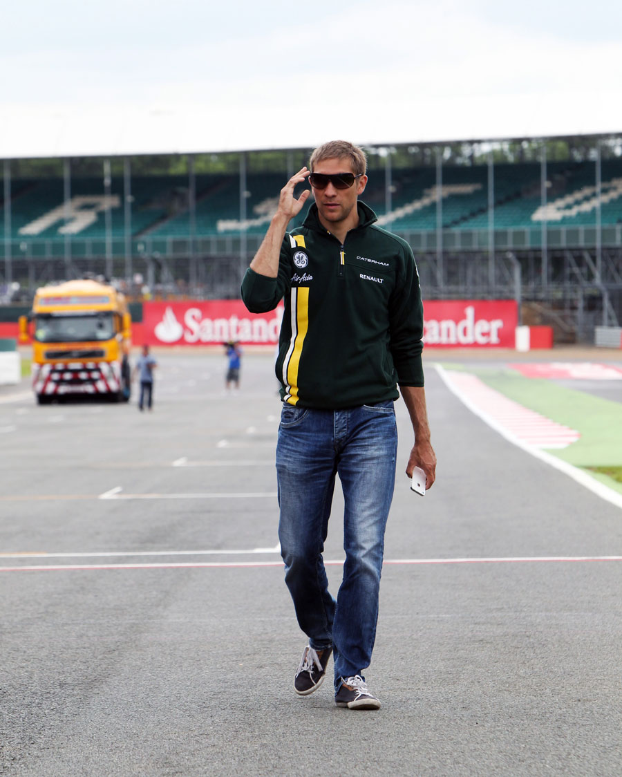 Vitaly Petrov walks the track on Thursday