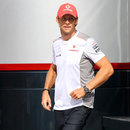 Jenson Button walks out of the McLaren motorhome on Thursday