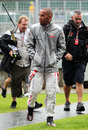 Some kind of a summer ... Lewis Hamilton arrives at soggy Silverstone