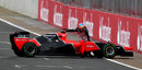Timo Glock pushes his Marussia after a spin in qualifying