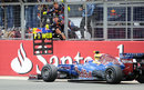 Mark Webber passes his pit board after taking victory