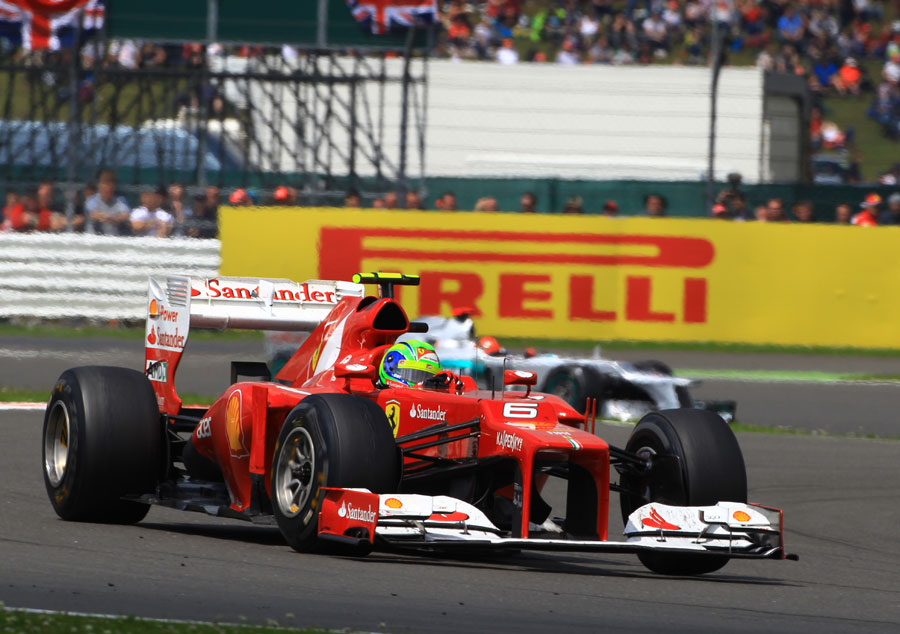 Felipe Massa leads Michael Schumacher in the race