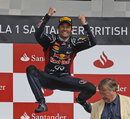 Mark Webber performs his customary celebration on the podium