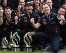 Mark Webber and Christian Horner celebrate Red Bull's 1-3 result