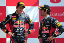 Sebastian Vettel and Mark Webber discuss their races on the podium