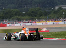 Paul di Resta recovers his car to the pits with a puncture