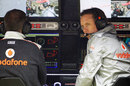 Sam Michael keeps an eye on proceedings from the McLaren pit wall