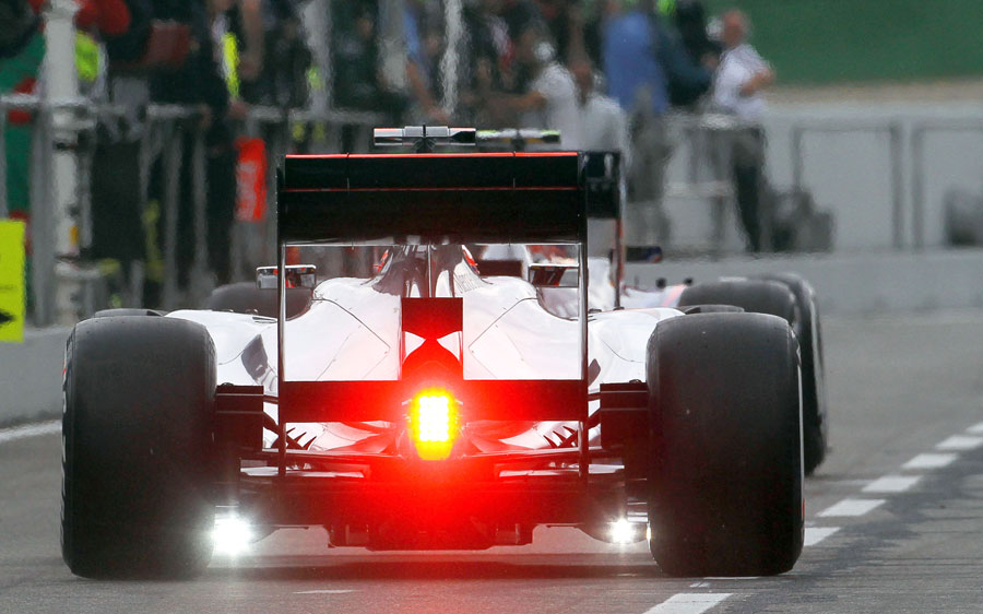 McLaren run measuring devices during the car's installation lap