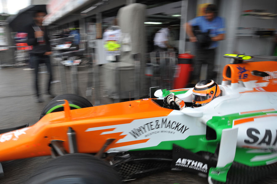 Nico Hulkenberg leaves the Force India garage