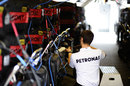 A Mercedes mechanic works on the team's allocation of tyres on Saturday morning