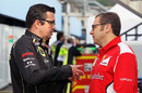 Eric Boullier and Stefano Domenicali deep in discussion in the paddock