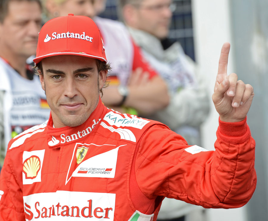 Fernando Alonso celebrates his pole position after qualifying