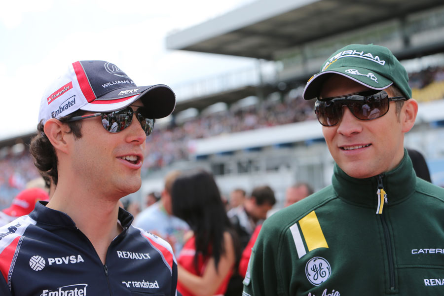 Bruno Senna and Vitaly Petrov chat ahead of the drivers' parade