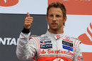 Jenson Button on the podium after the race