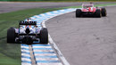 Sebastian Vettel runs wide in pursuit of Fernando Alonso