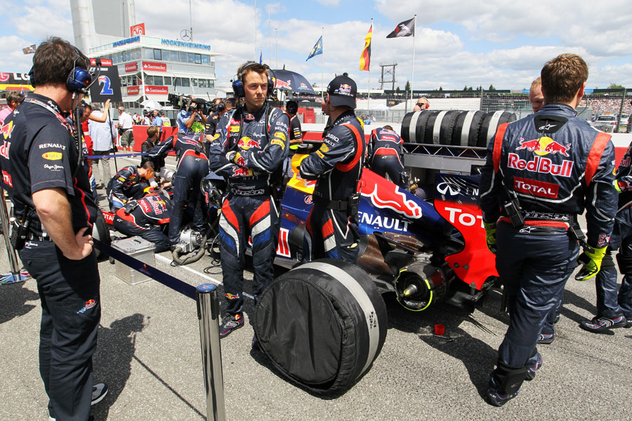 Red Bull mechanics on the grid