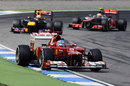 Fernando Alonso leads Sebastian Vettel and Lewis Hamilton
