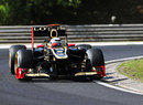 Kimi Raikkonen on track with the Lotus double-DRS on Friday morning