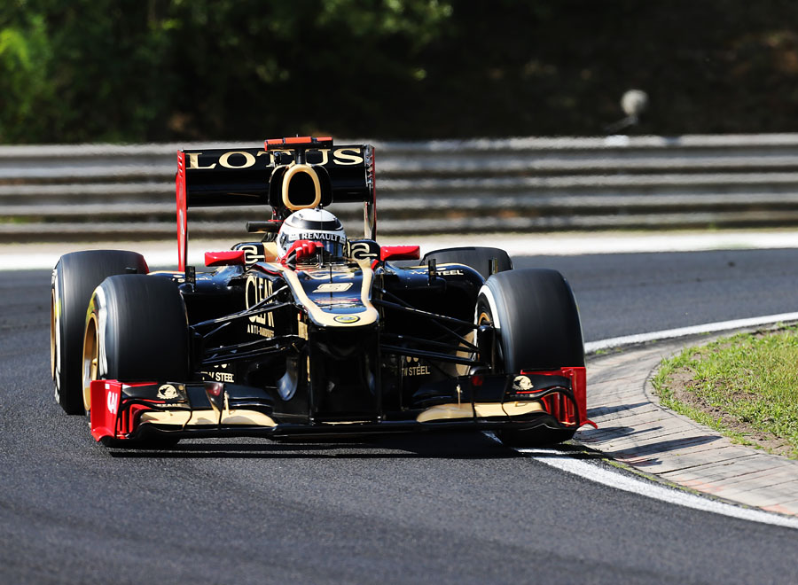 Kimi Raikkonen on track with the Lotus double-DRS on Friday morning