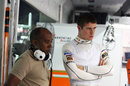 Paul di Resta with his manager Anthony Hamilton in the Force India garage