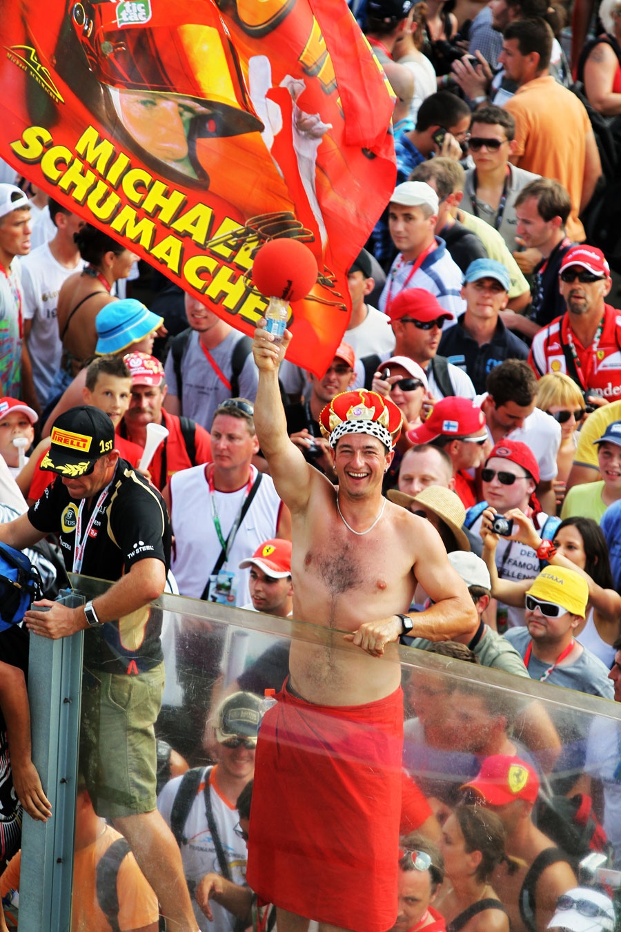 A fan enjoys himself after invading the track following the race