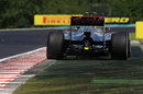 Lewis Hamilton runs wide in the McLaren