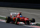 Fernando Alonso opens the DRS on his Ferrari