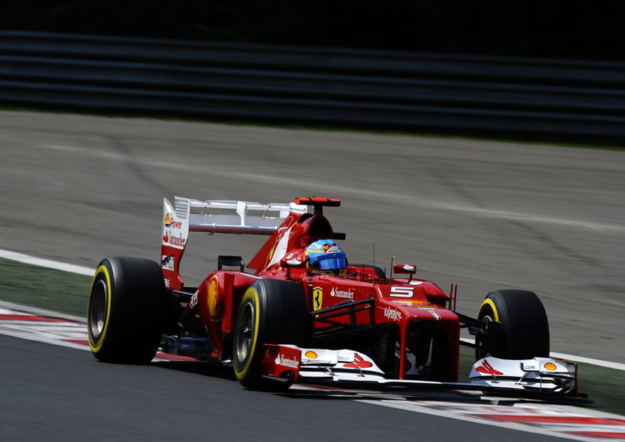 Fernando Alonso opens the DRS on his Ferrari