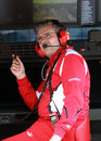 Pat Fry deep in thought on the Ferrari pit wall
