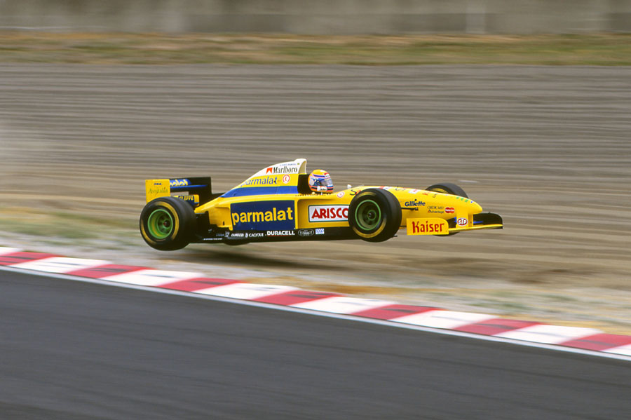 Roberto Moreno gets airborne having run wide over the kerb