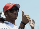 Lewis Hamilton cuts a relaxed figure on the driver parade