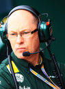 Caterham technical director Mark Smith watches on from the pit wall