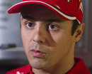 Felipe Massa talks to the press during an FIA road safety seminar